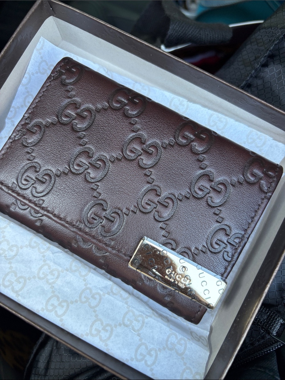 Gucci Dark Brown Embossed GG Leather Card holder with Metal Plaque
